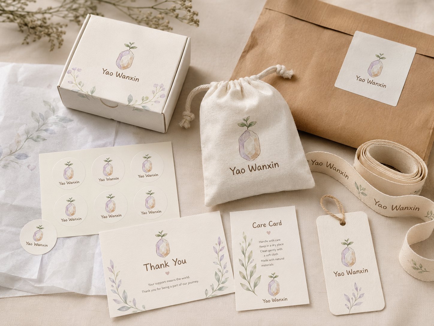 Botanical packaging concept with a box, pouch, cards, stickers and tissue paper